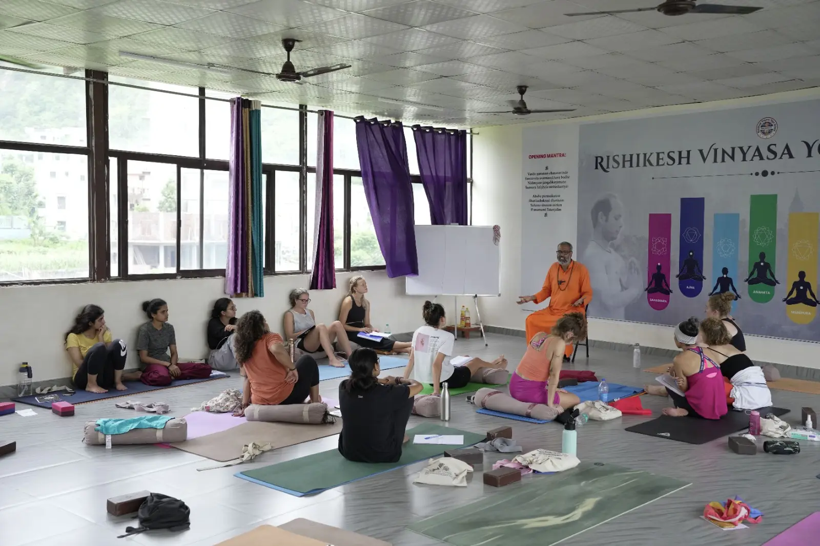 students teaching in yoga class