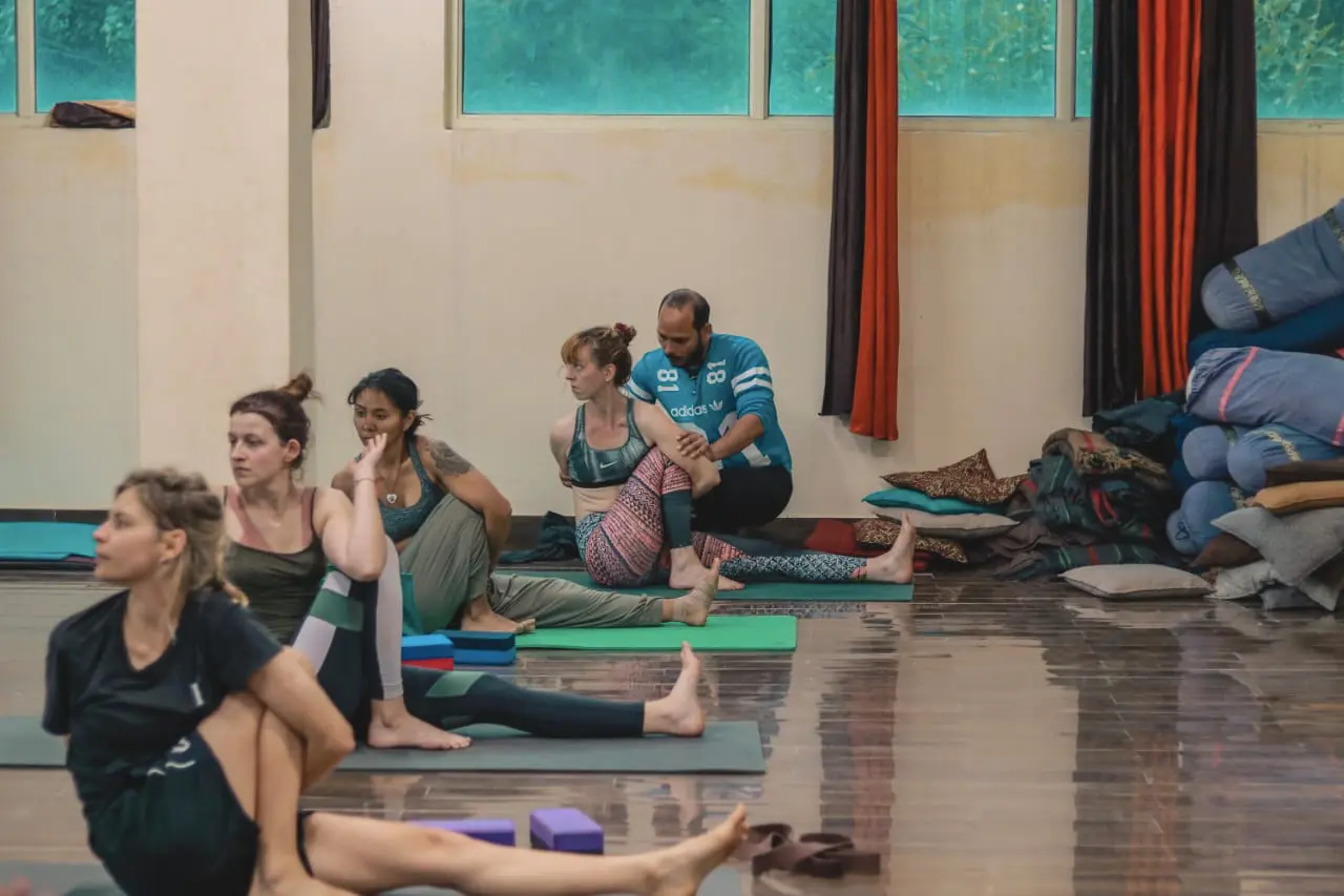 Student performing asana during 100 hour yoga teacher training in Rishikesh